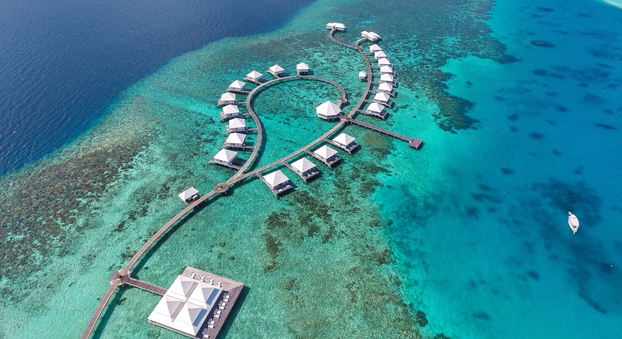 Diamonds Thudufushi Beach & Water Villas вид отеля с самолета Diamonds Thudufushi Beach & Water Villas Вид Отеля С Самолета